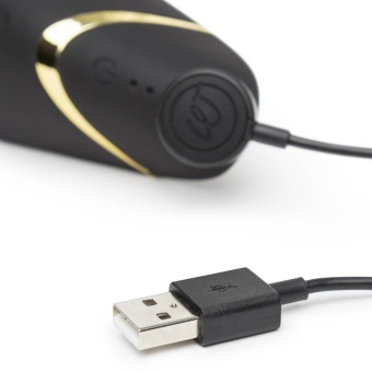 Бесконтактный клиторальный стимулятор Womanizer Premium чёрный/золото